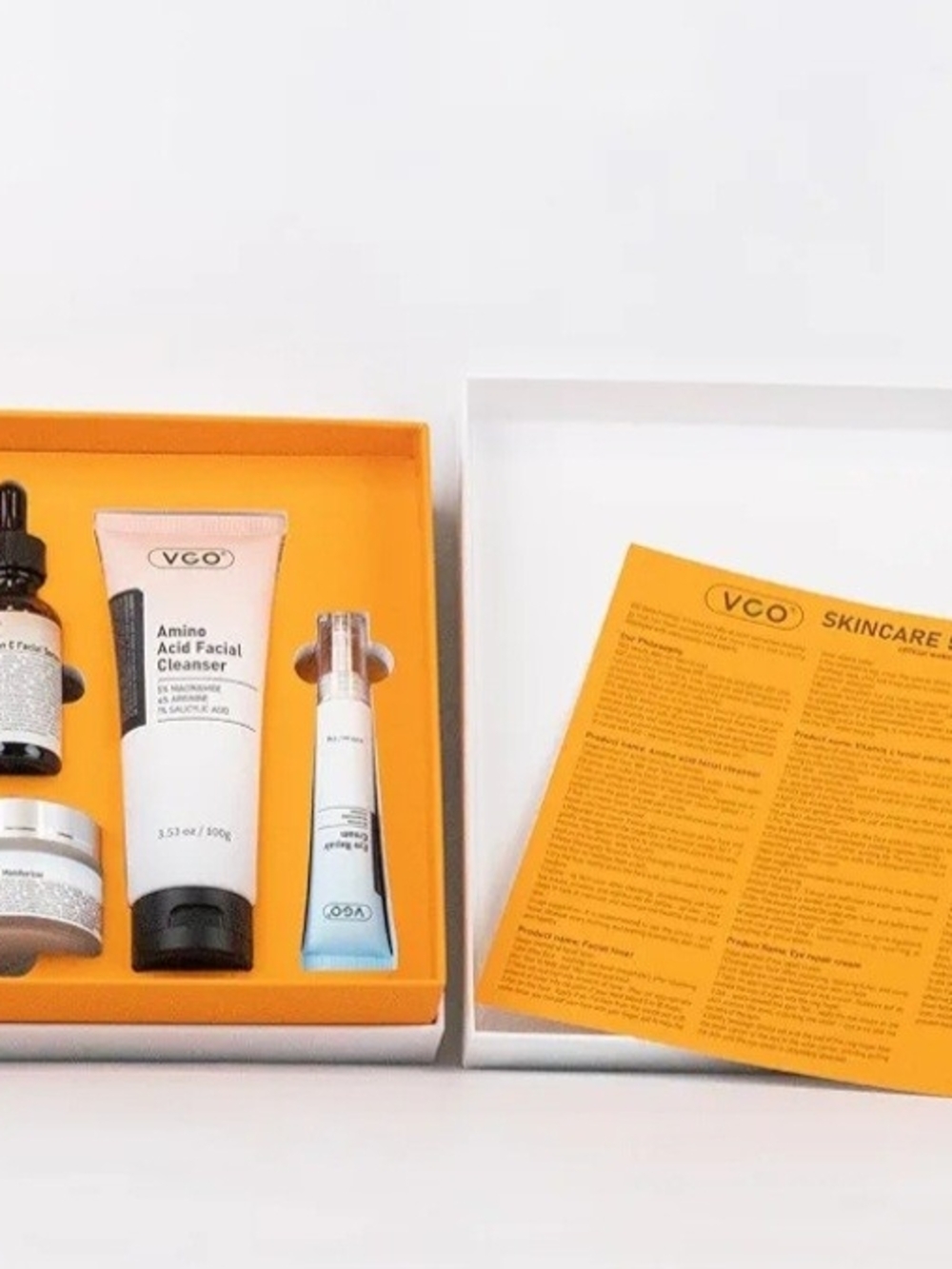 CO Skincare Set with White, Orange & Black Packaging